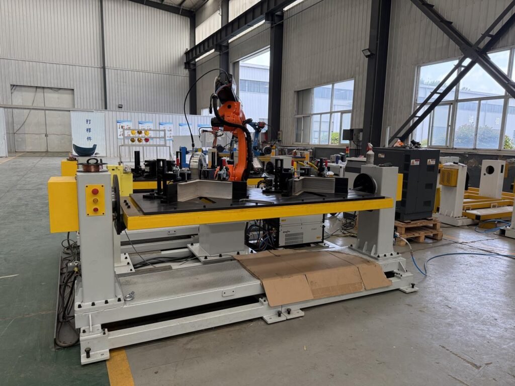 Robot welding installation with multiple workholding stations